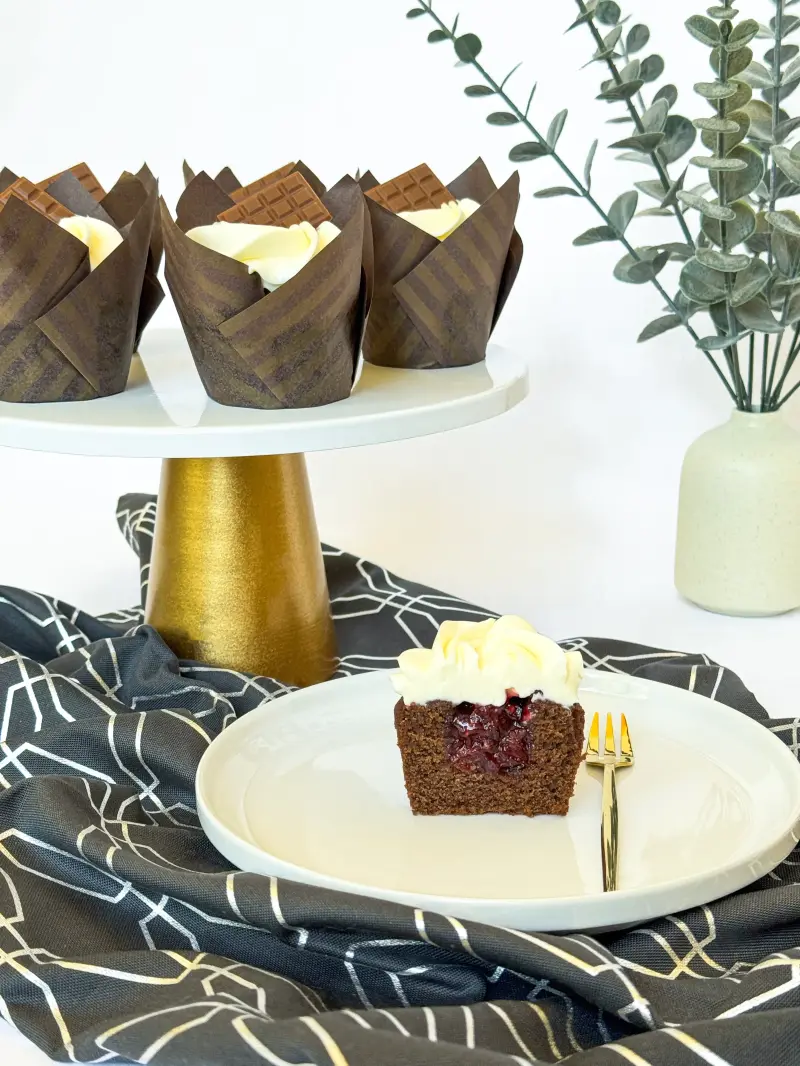 cut inside of chocolate cherry cupcake Active Image