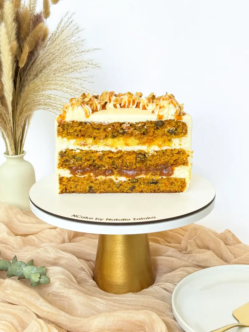 half of carrot cake on the cake stand Active Image