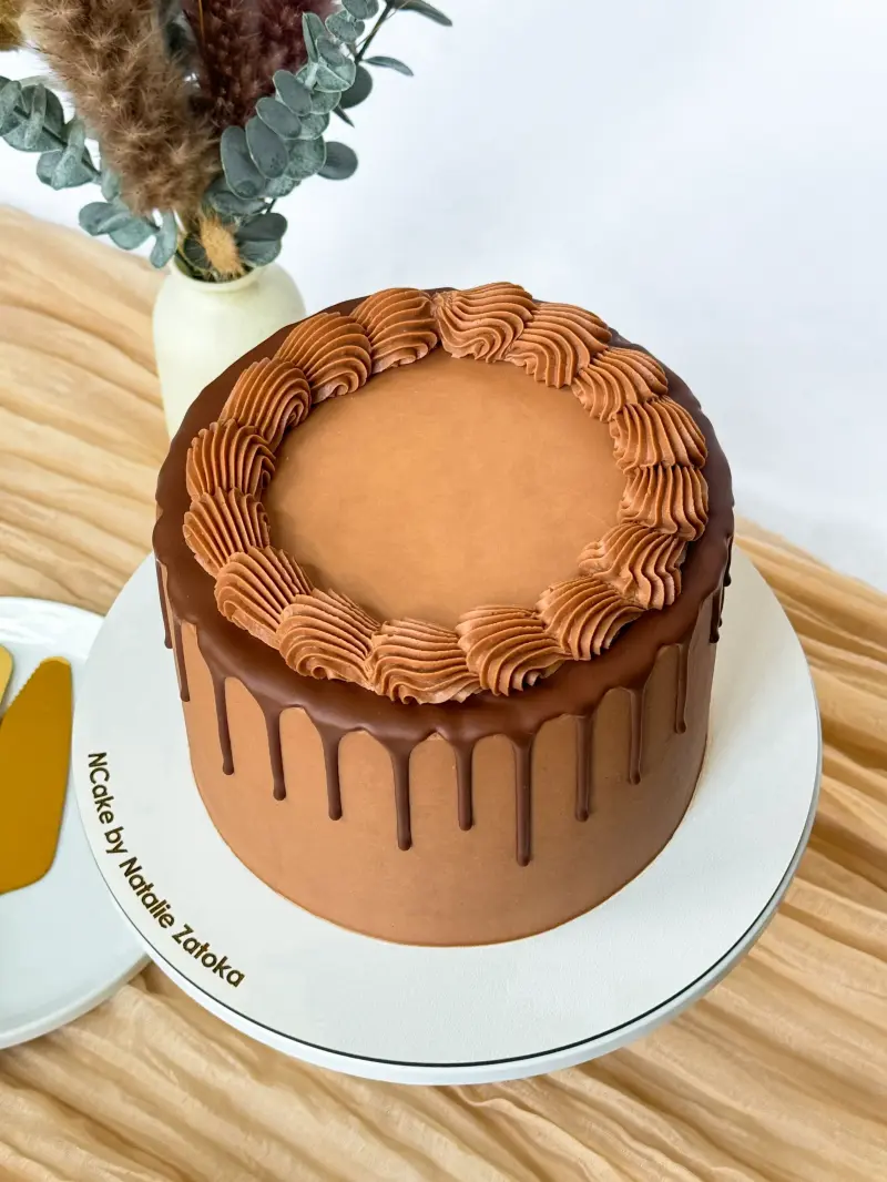 whole chocolate cake top view Active Image