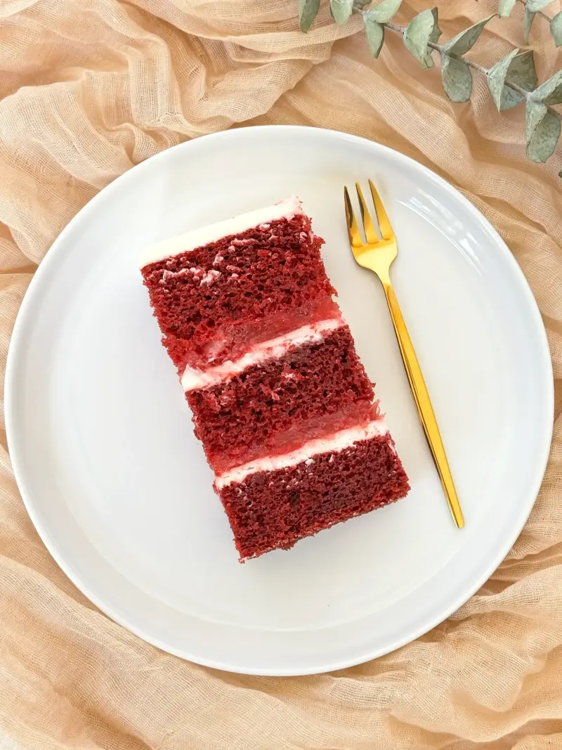 slice of red velvet cake on the cake plate Active Image