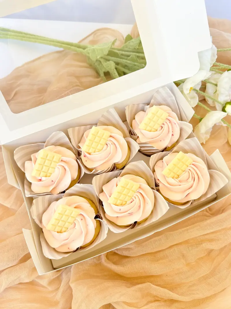 vanilla strawberry cupcakes in the box Active Image