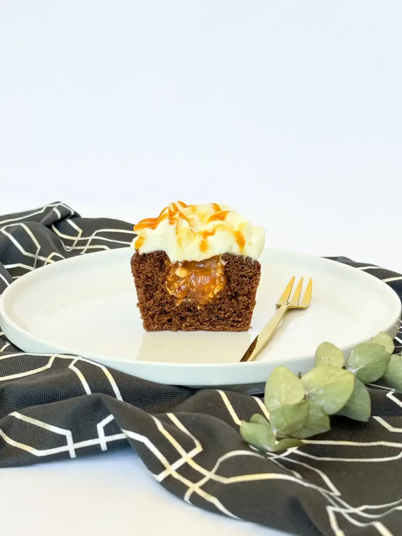 Chocolate cupcakes with caramel and peanut Active Image