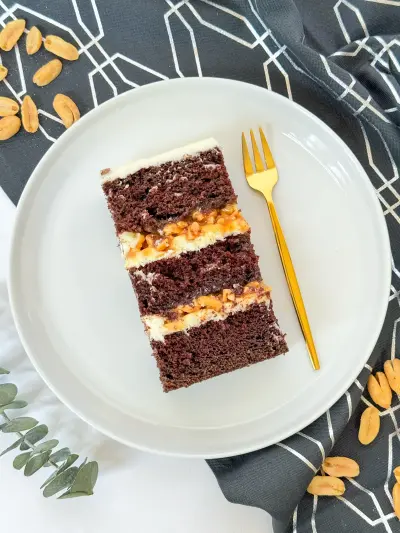 slice of snickers cake on the cake plate 78