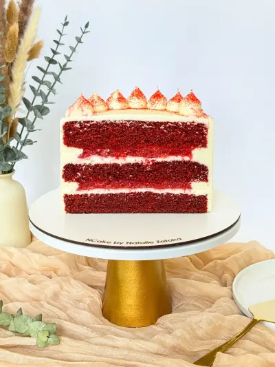 half of red velvet cake on the cake stand 61