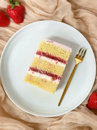 slice of vanilla strawberry cake on the cake plate 69