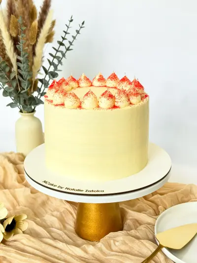 whole red velvet cake on the cake stand