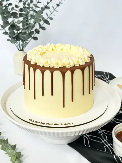 whole cake snickers on the cake stand